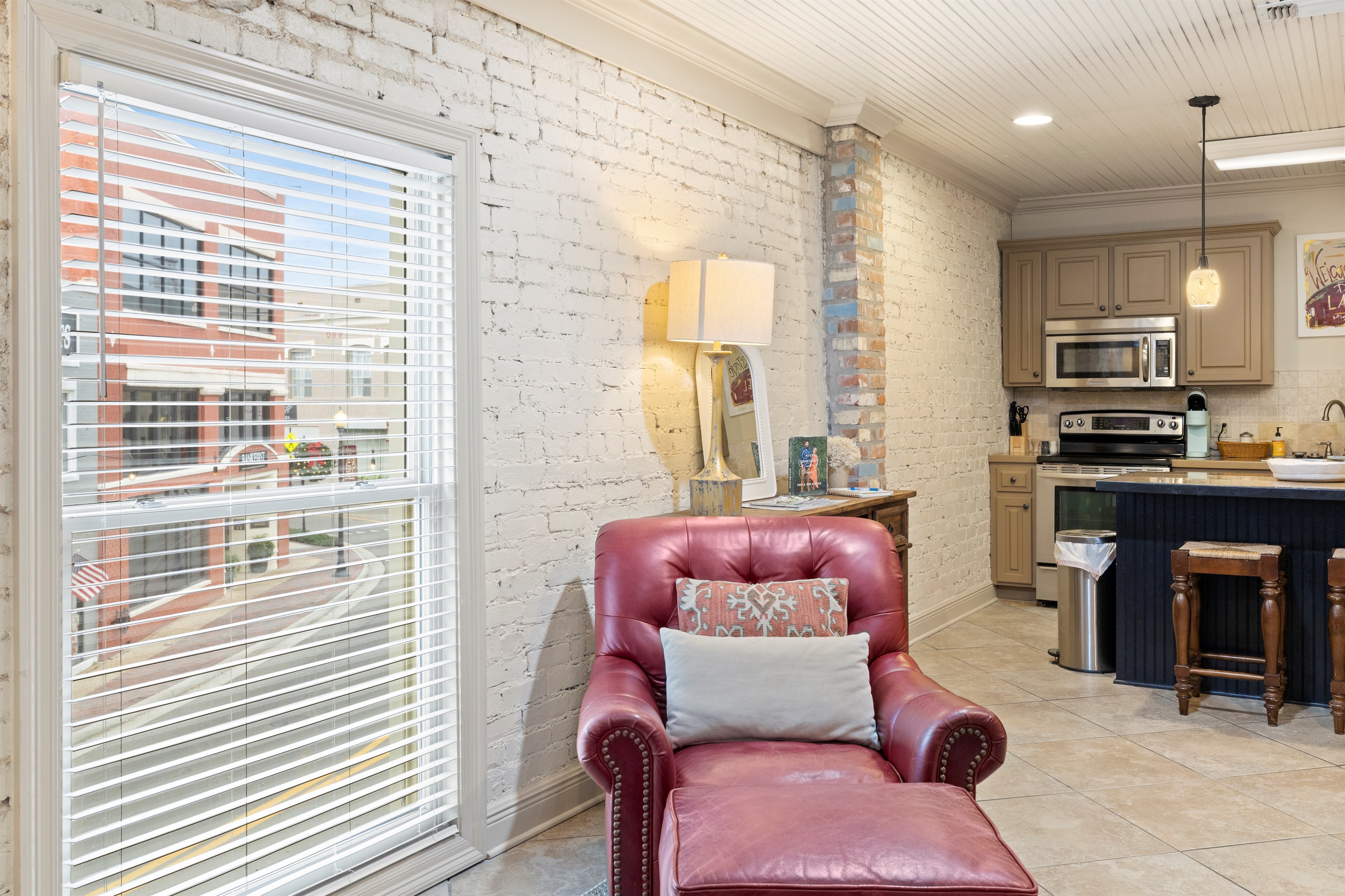 Beautiful windows fill the living space with natural light — perfect for morning coffee or evening relaxation.