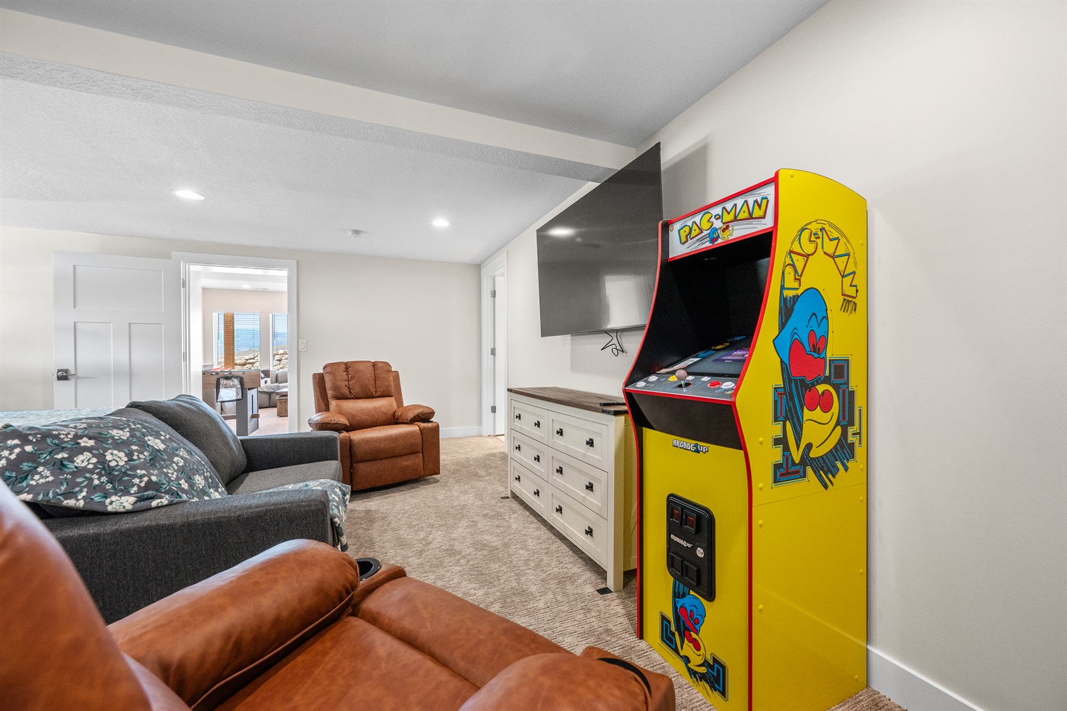 Play PAC MAN or stream a movie in the bunk room.