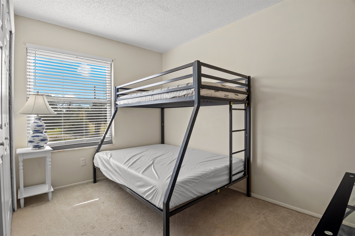 Upstairs bedroom #3. Full size bed on the bottom bunk. Twin sized bed on top bunk.