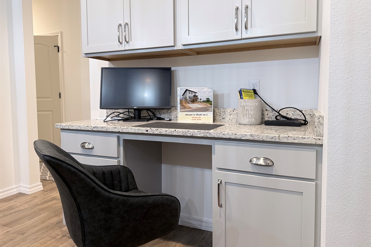 work space for catching u on emails. Monitor available if needed. Surge strip on counter.