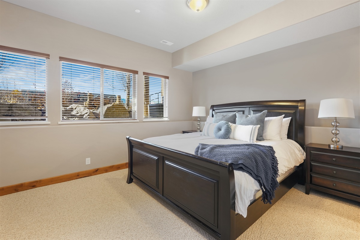 A comfortable bedroom retreat with soft light and peaceful surroundings for a restful night.