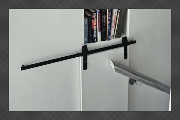 Assorted reading material including Greek language and tour books; a hidden compartment for the vacuum cleaner