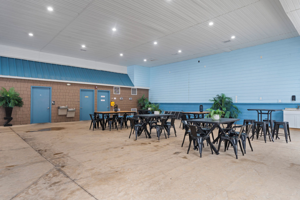 Indoor pool. Heated, and fun kid friendly features. Bathrooms, lounge chairs, and dining tables. Open year round.