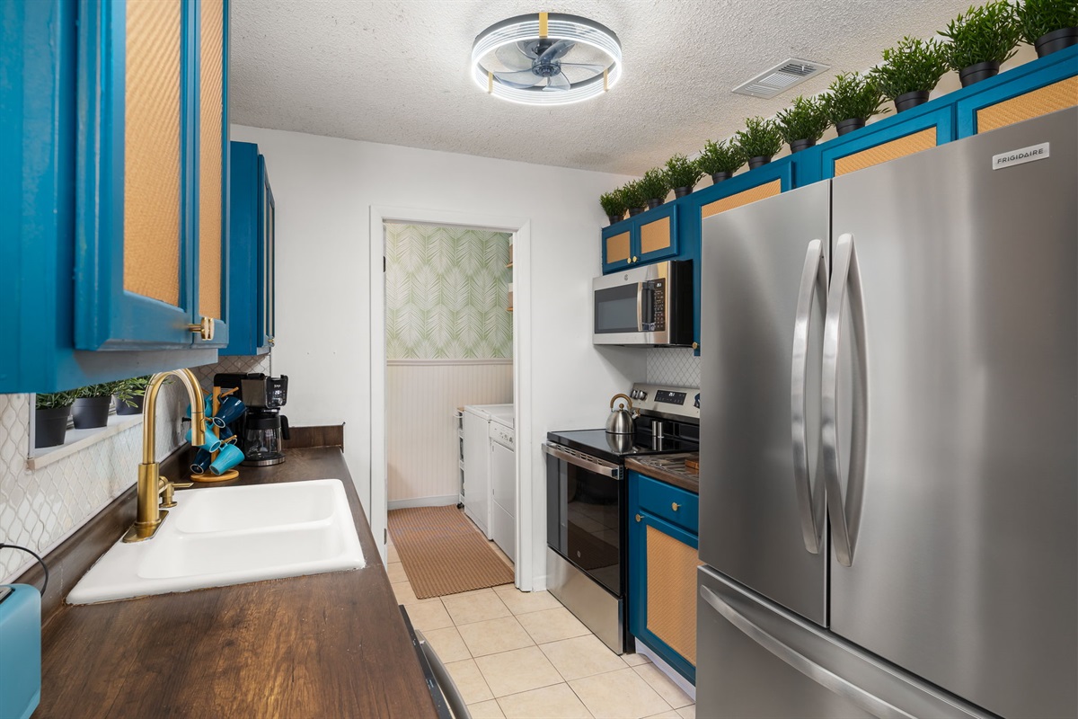 The bright kitchen makes for a great place to meal prep with friends or family!