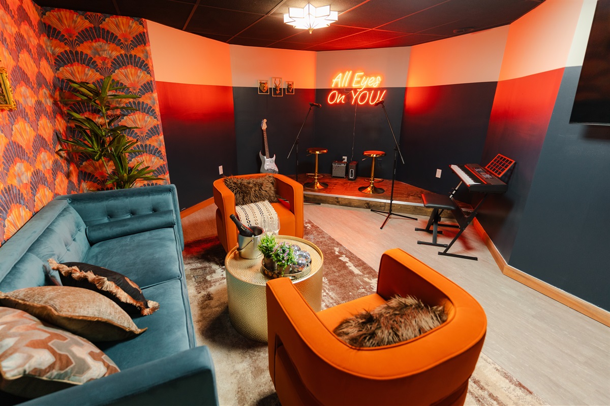 Our Karaoke lounge, spin a record and enjoy a drink at the bar