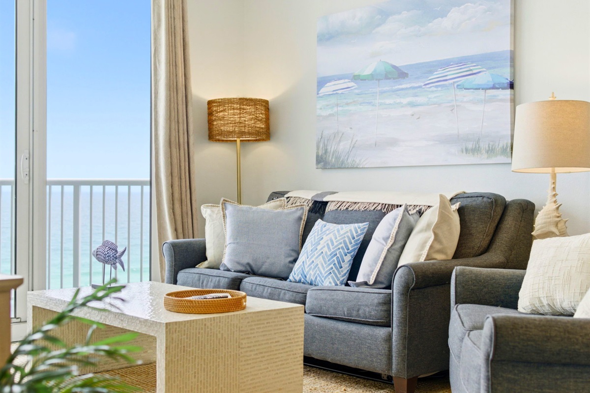Filled with natural light and coastal charm, the living room offers a comfortable place to relax while enjoying beautiful beach views.