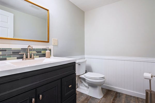 Welcome to our cozy half bath in the basement — a quiet spot to refresh!
