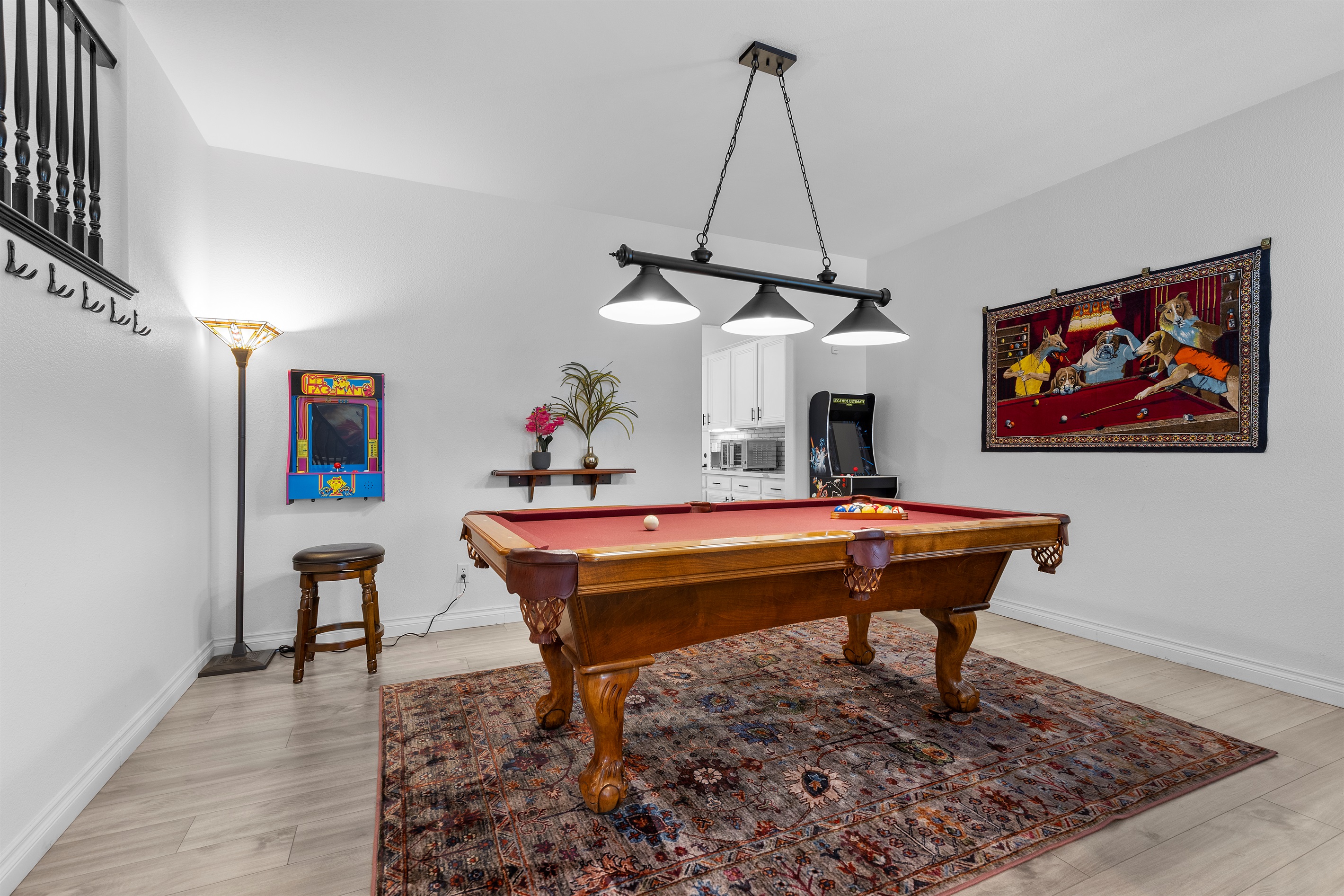 Awesome indoor game room with a true slate pool table and 2 arcade machines, Ms. PacMan and Legends Ultimate Mini.  It's Showtime!