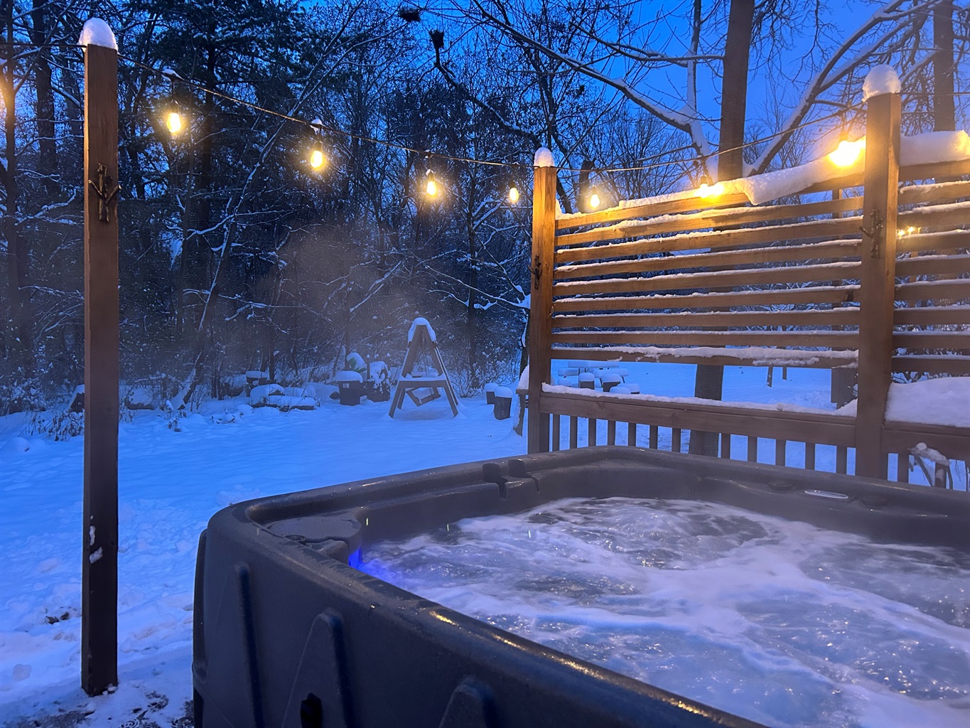 Relax in the hot tub under the cafe lights. Sometimes you can hear an owl hoot from one of the neighboring trees.
