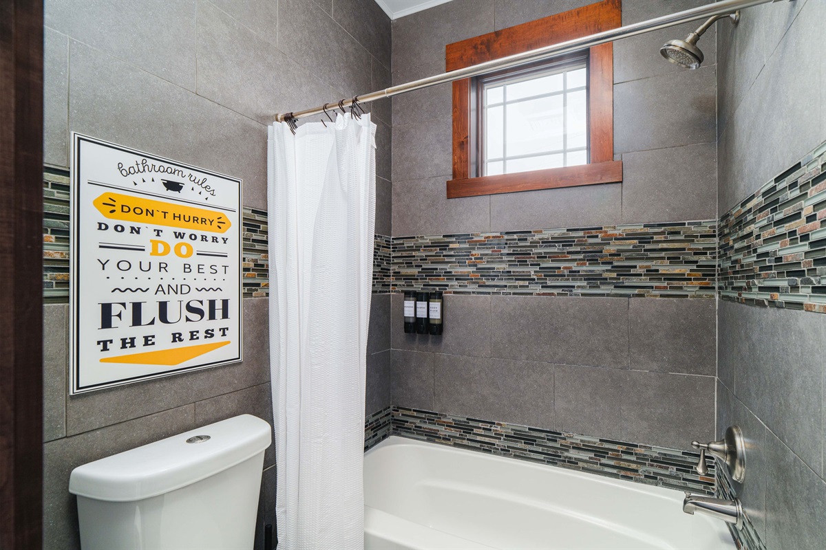 Bright and functional full bath designed to serve multiple bedrooms with ease.