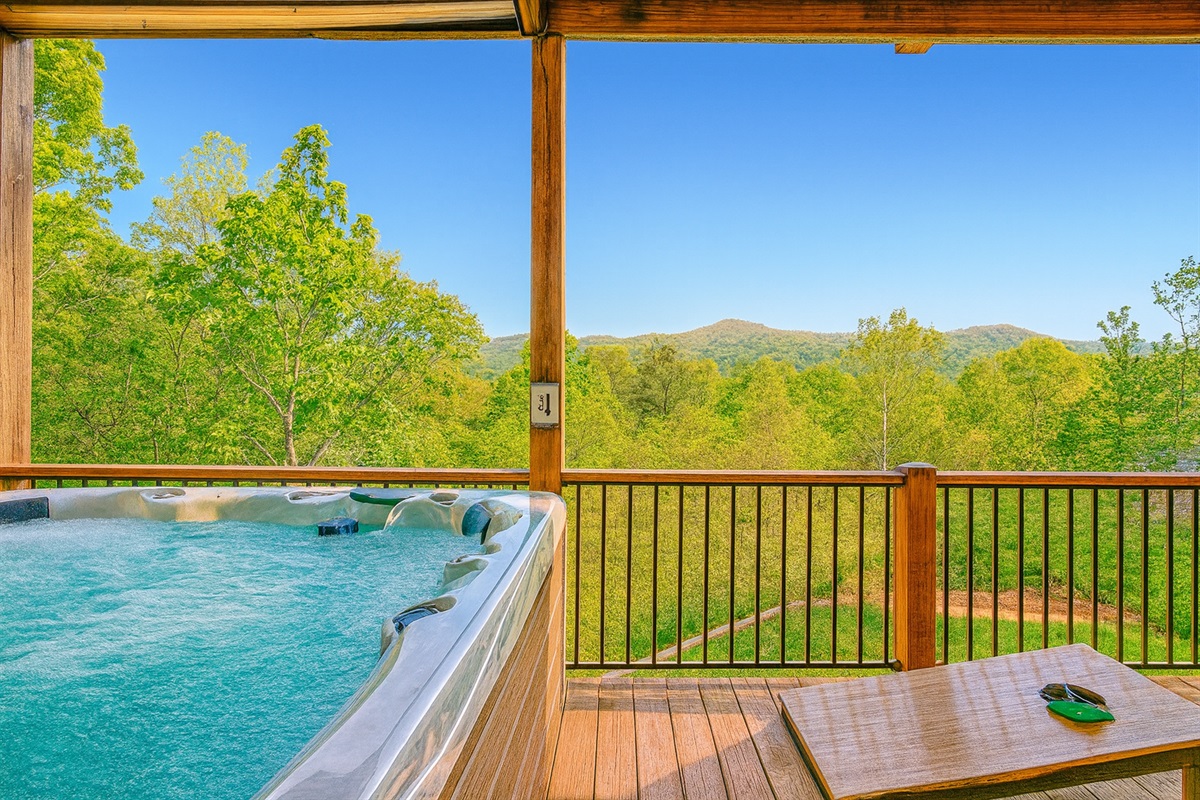 Soak in the Hot Tub while taking in the Mountains