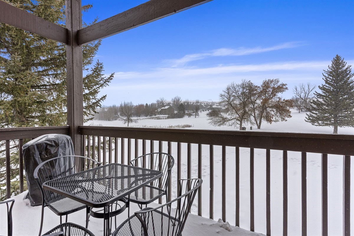 Private balcony with seating—enjoy morning coffee with peaceful mountain views.