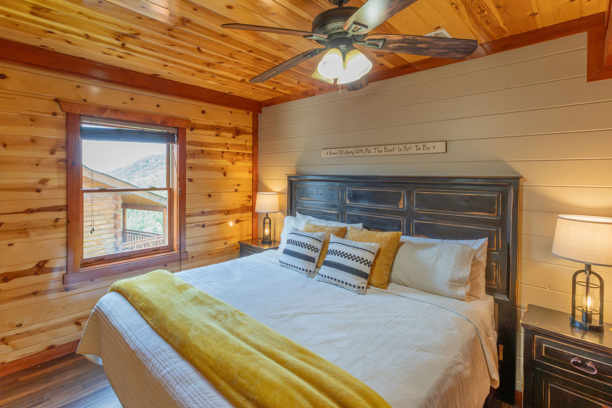 Settle in for the perfect movie night for two in this cozy mountain bedroom.