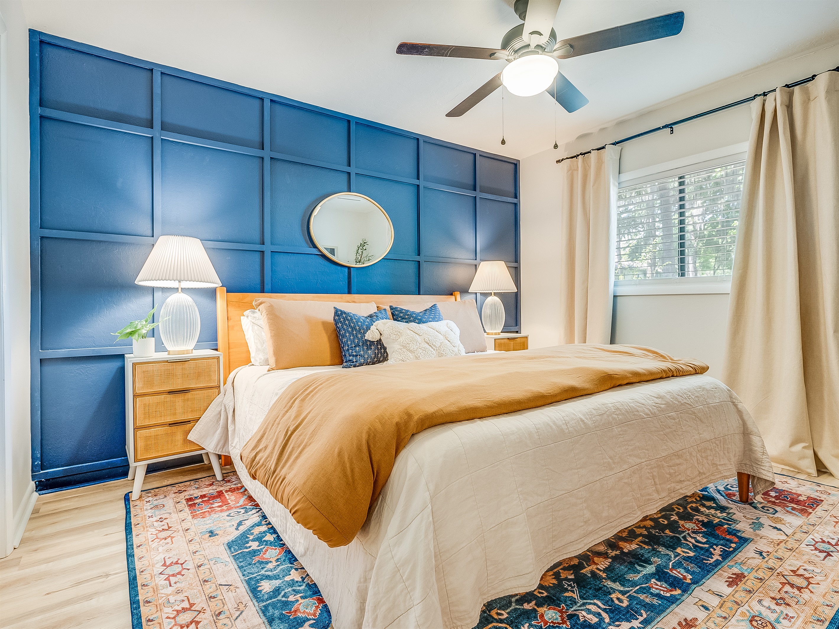 This serene bedroom features a cozy queen bed and a calming atmosphere for restful nights.