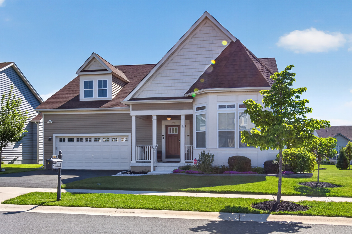 Single-family executive residence in Bayberry South with attached 2-car garage and 2-car private driveway.
