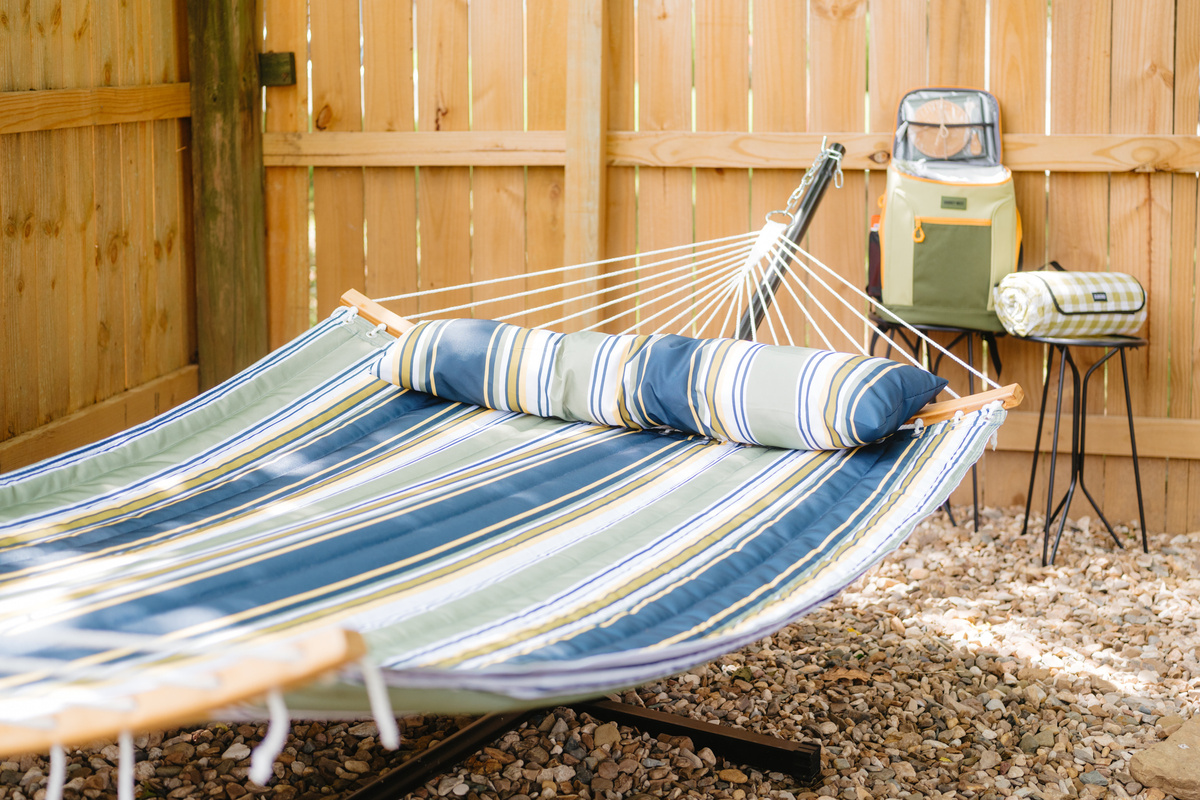 Unwind with a good book or an afternoon nap in the backyard hammock.