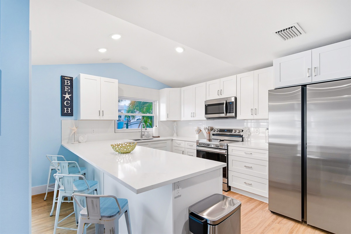 Bar stools mean cooks can enjoy company.