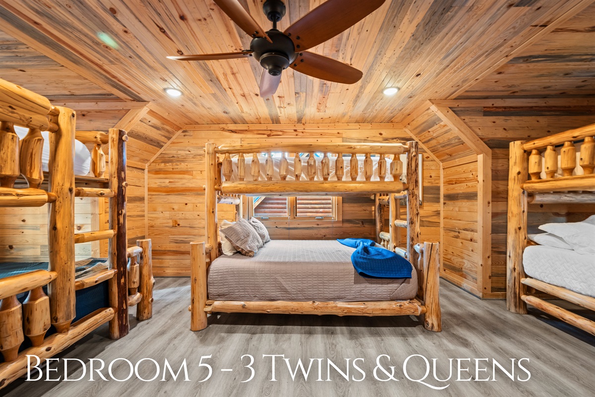 Designed with larger groups in mind, this bedroom includes multiple beds and plenty of space so everyone can sleep comfortably without feeling crowded.