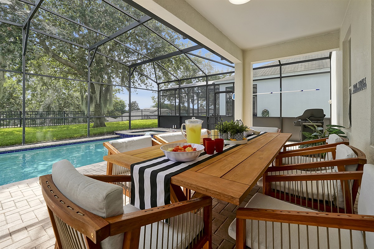 Eat a meal poolside at the lanai table with seating for 8.