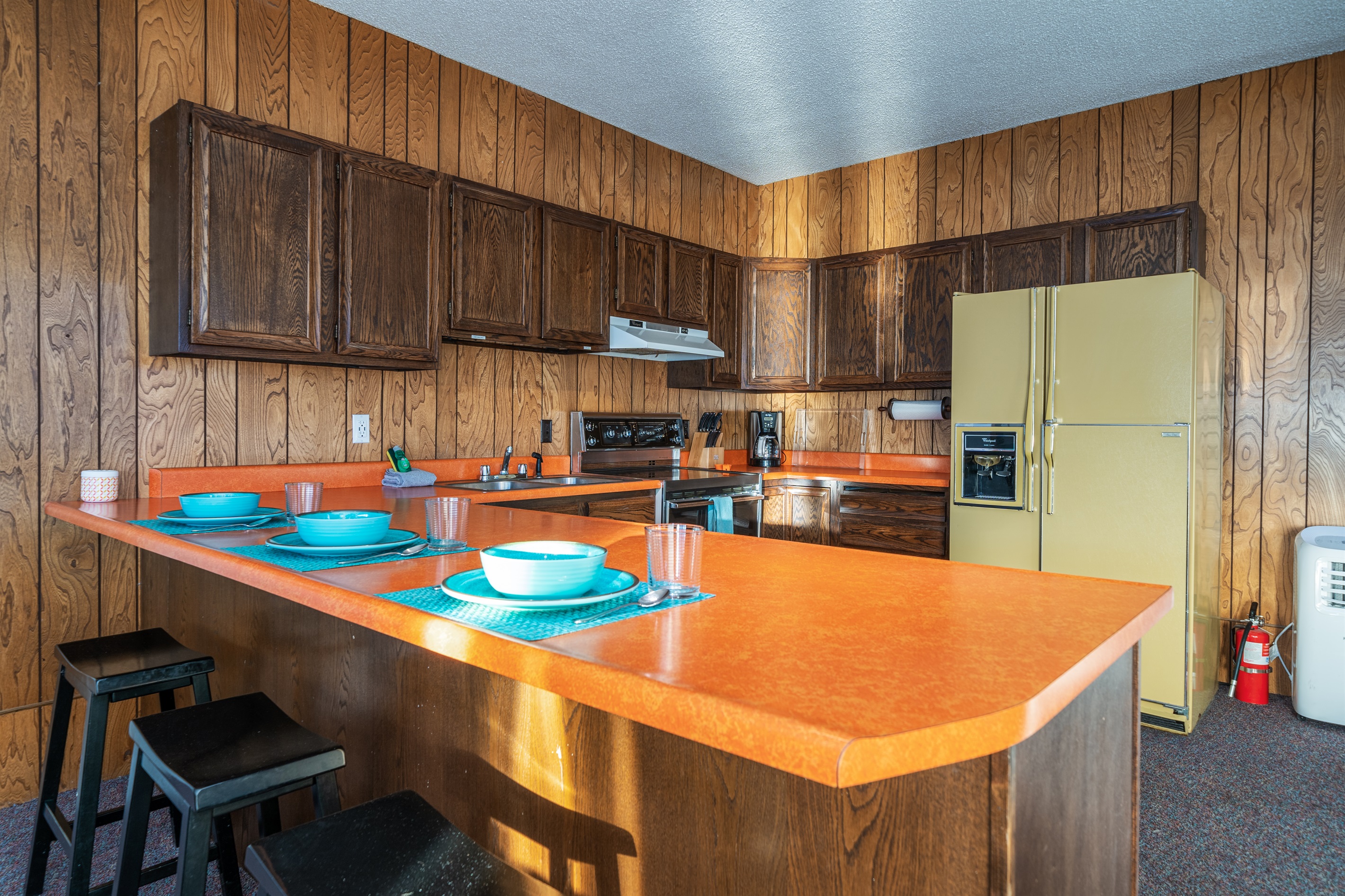 Downstairs second kitchen with 1970's vibe with original features and design