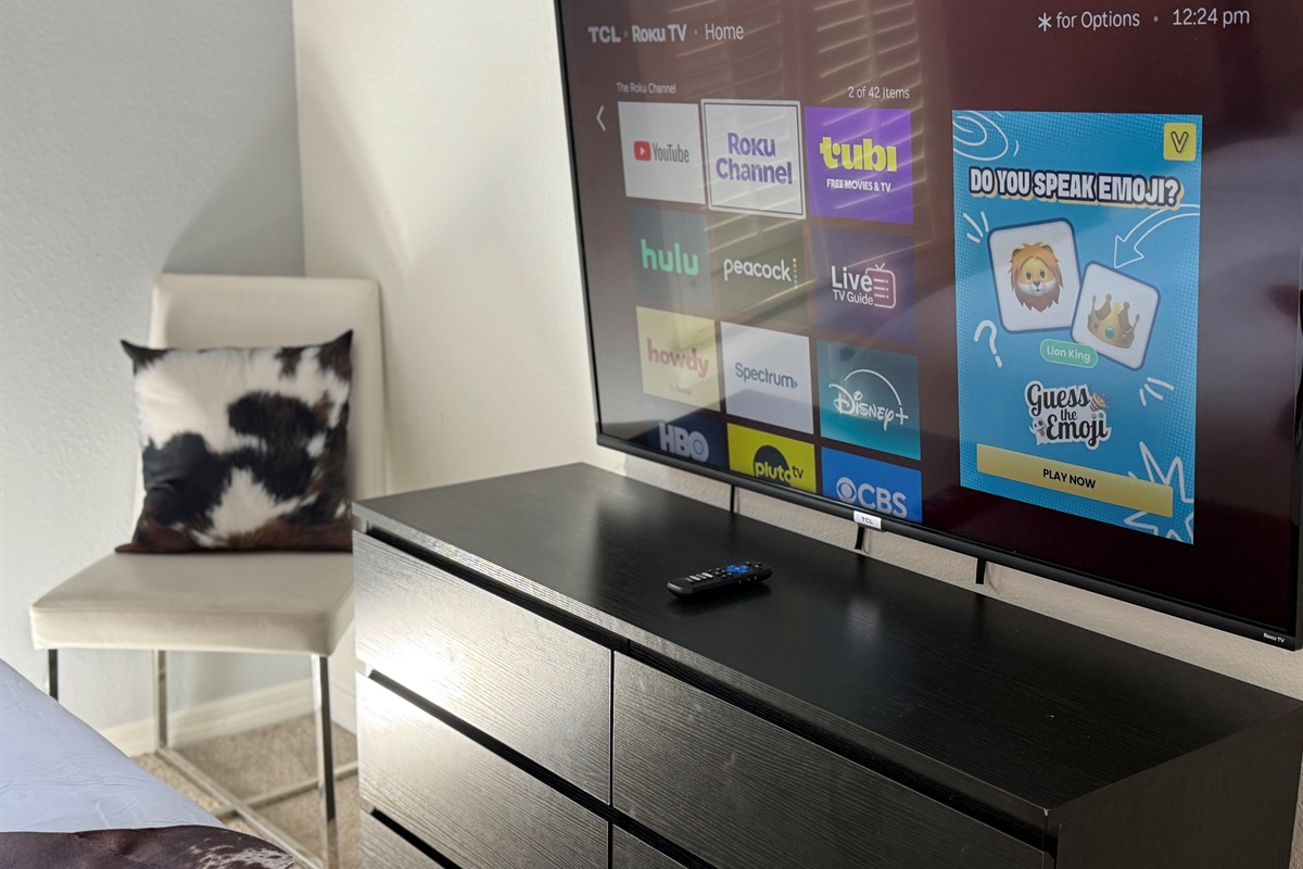 Experience premium in-room entertainment with 50” smart TVs in every bedroom