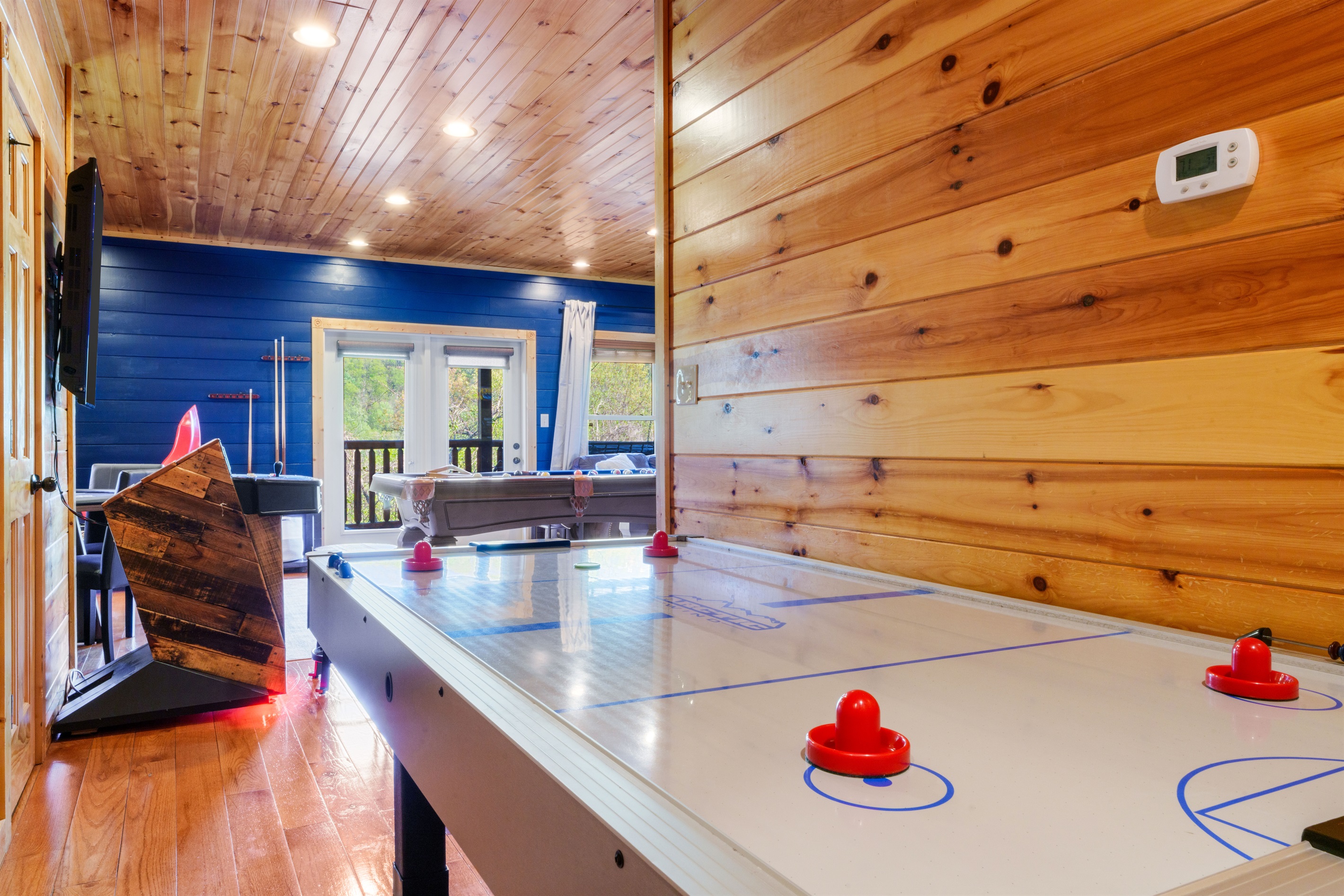 Heat up the competition at the air hockey table.