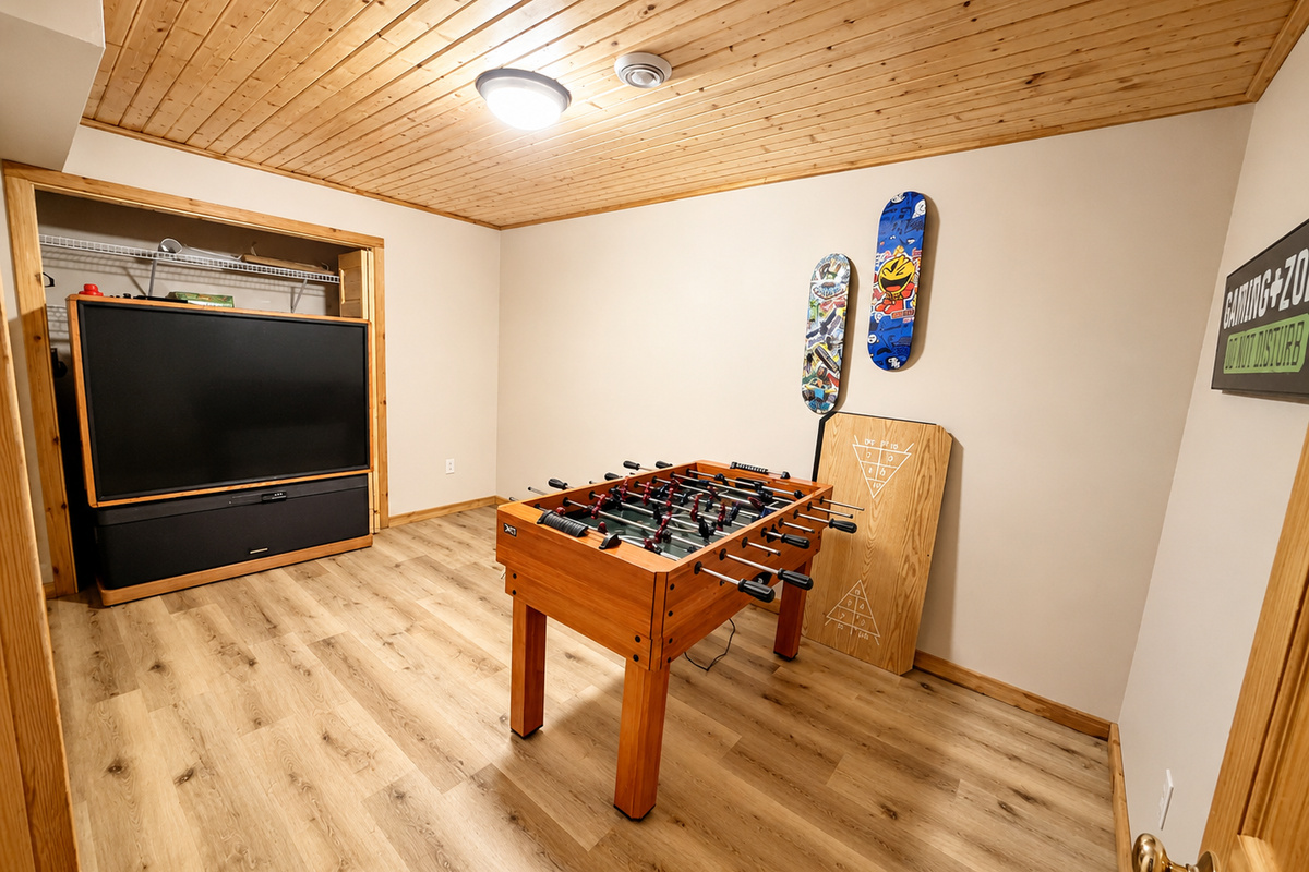 Game room with foosball gives kids and adults a fun place to hang out between Northwoods adventures.
