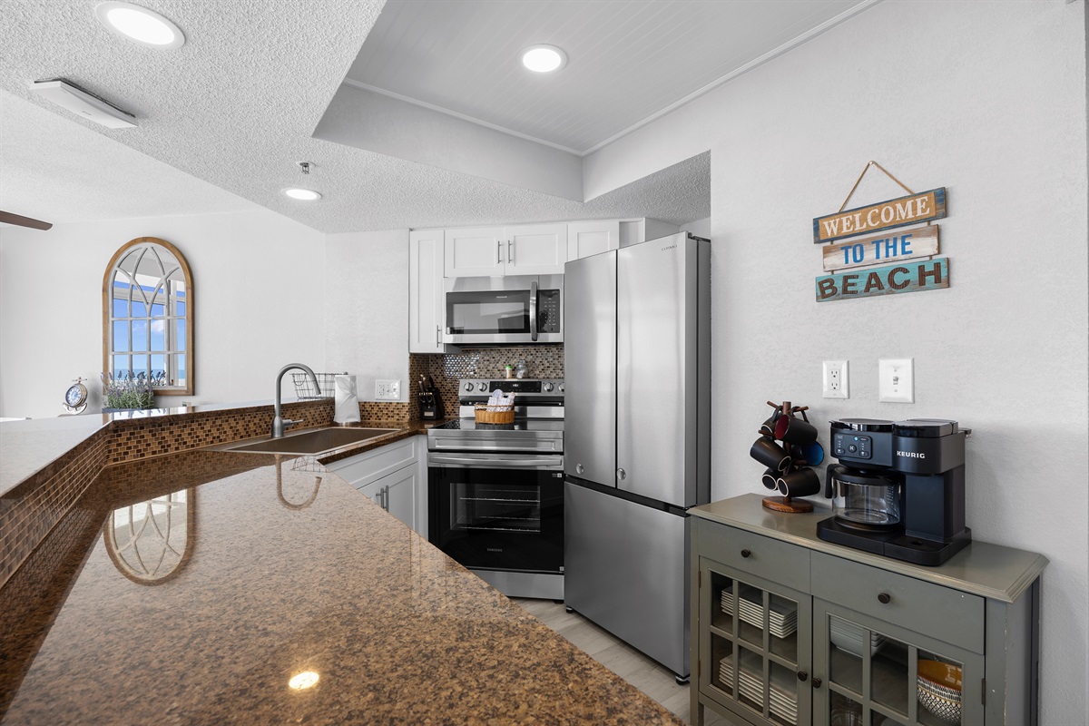 Enjoy our updated kitchen with brand-new appliances—perfect for cooking your favorite meals while enjoying beach life.