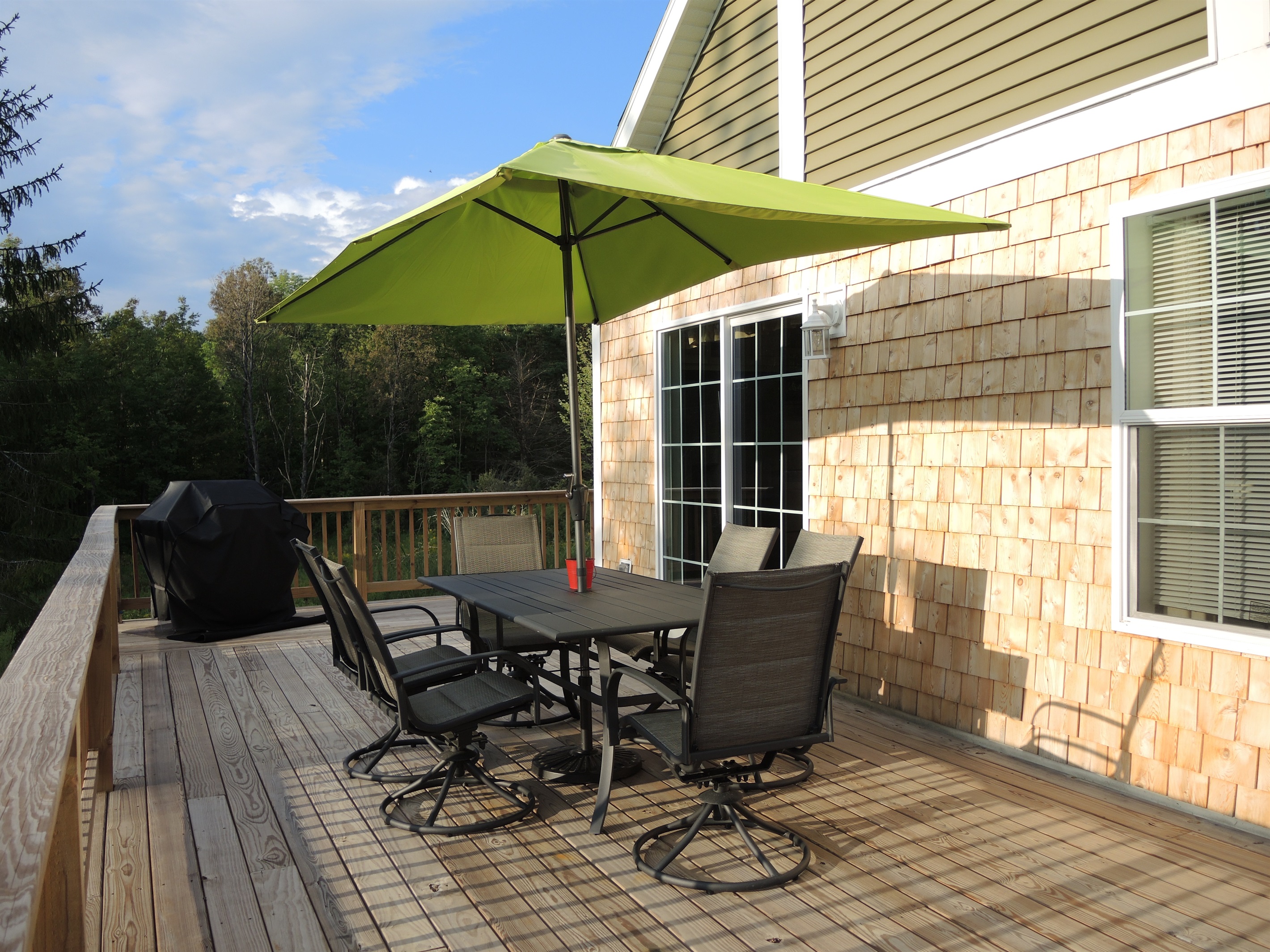 Spacious deck for outdoor dining and grilling