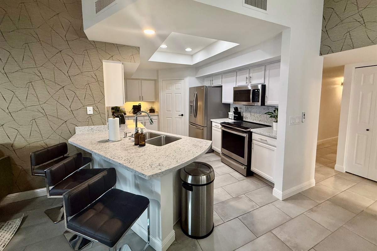 Kitchen Opens to Family Room 2 and Dining