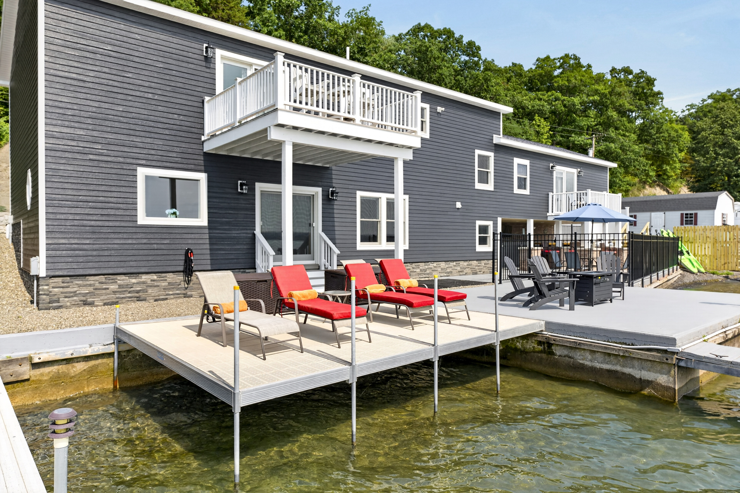 Lakeside deck with lounge seating