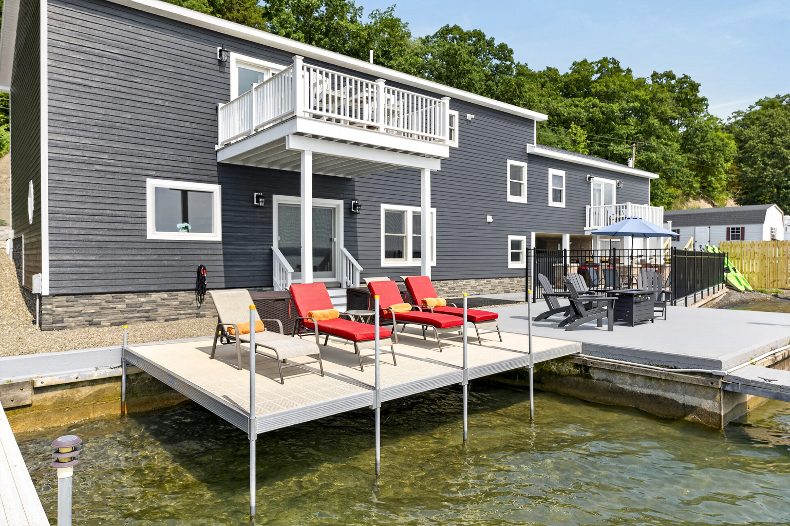 Lakeside deck with lounge seating