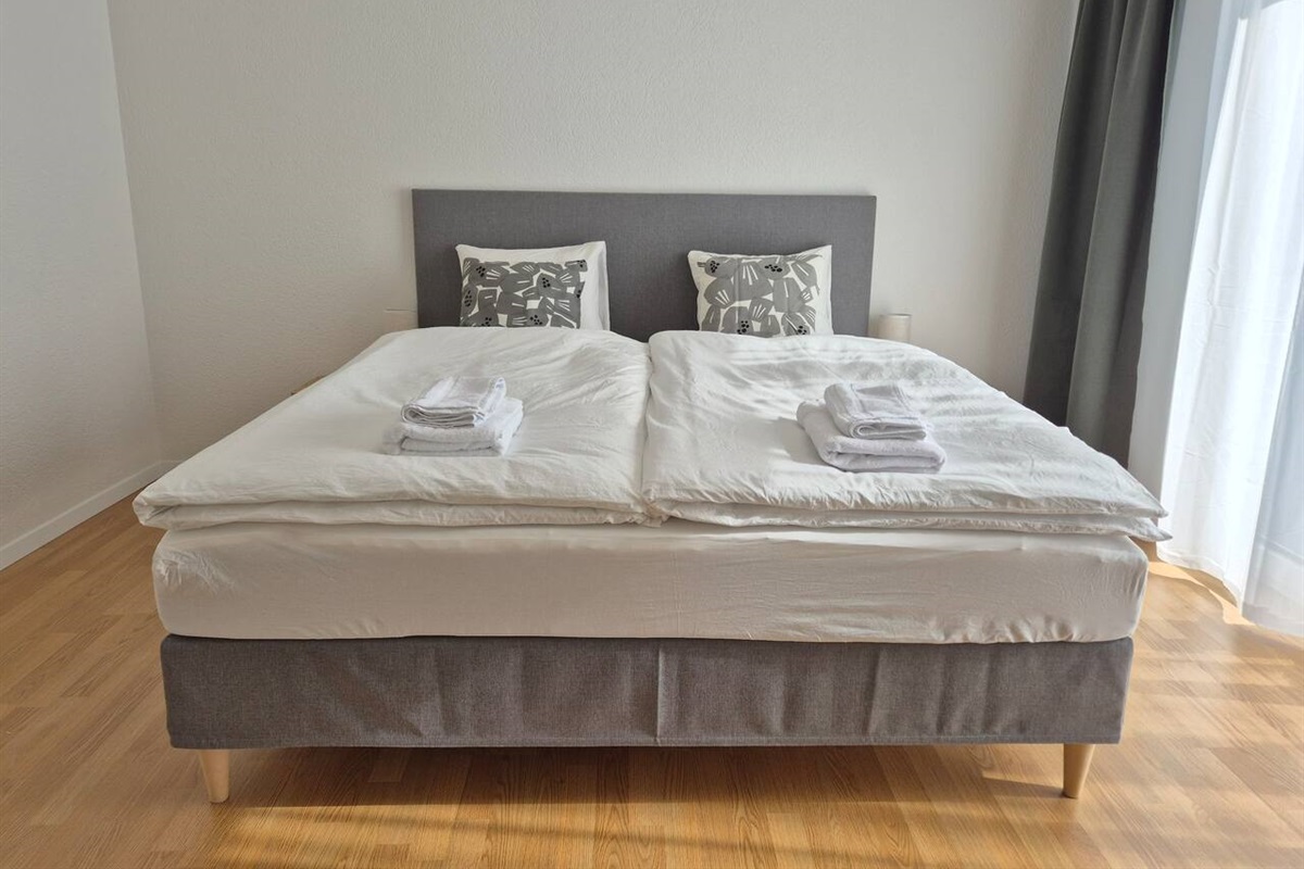 The king sized box spring bed with memory foam topper