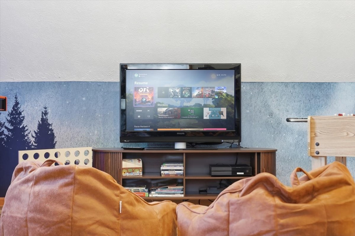 A cozy little gaming nook where kids can claim their own space of the chalet