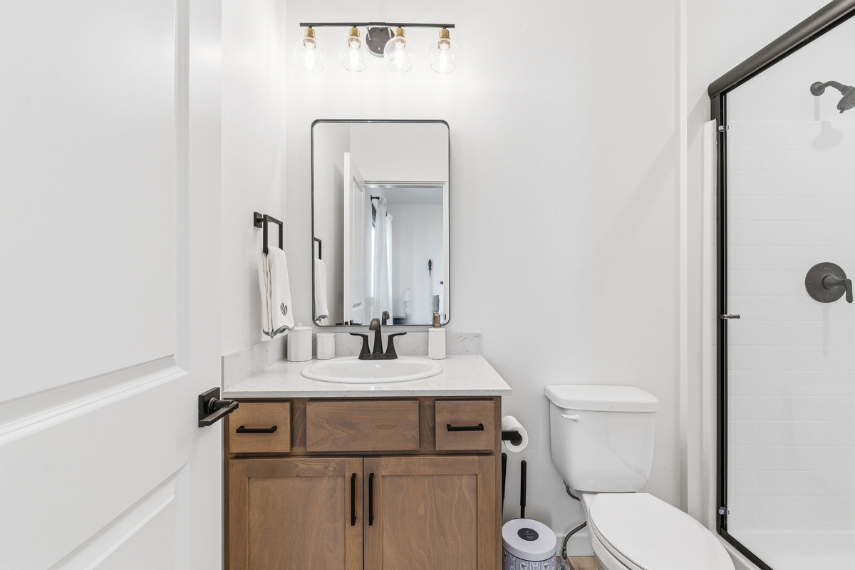 Step into a spacious walk-in shower designed to help you recharge. Clean lines, modern finishes, and everything you need for a relaxing stay
