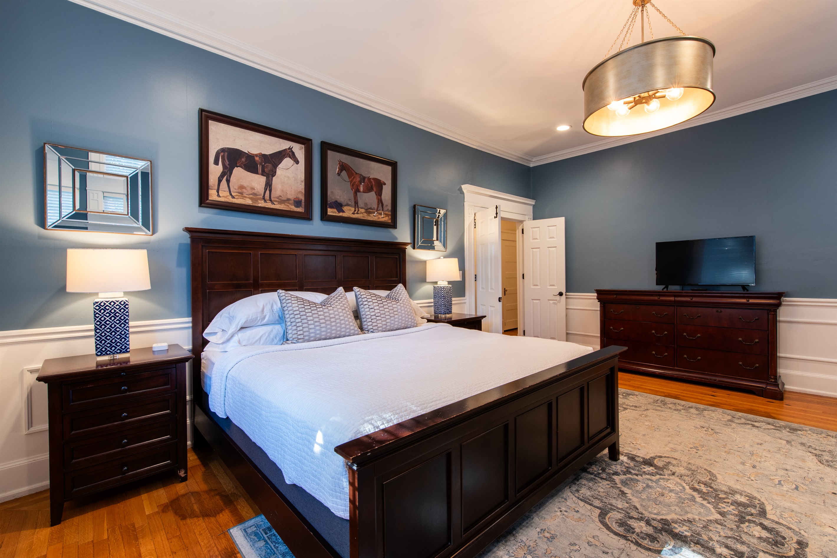 Primary Bedroom ~ 1st Floor ~ King Size Bed ~ Attached Renovated Full Bath ~ Walk in Closet ~ 50" Smart TV ~ Single Pull Out Sofa