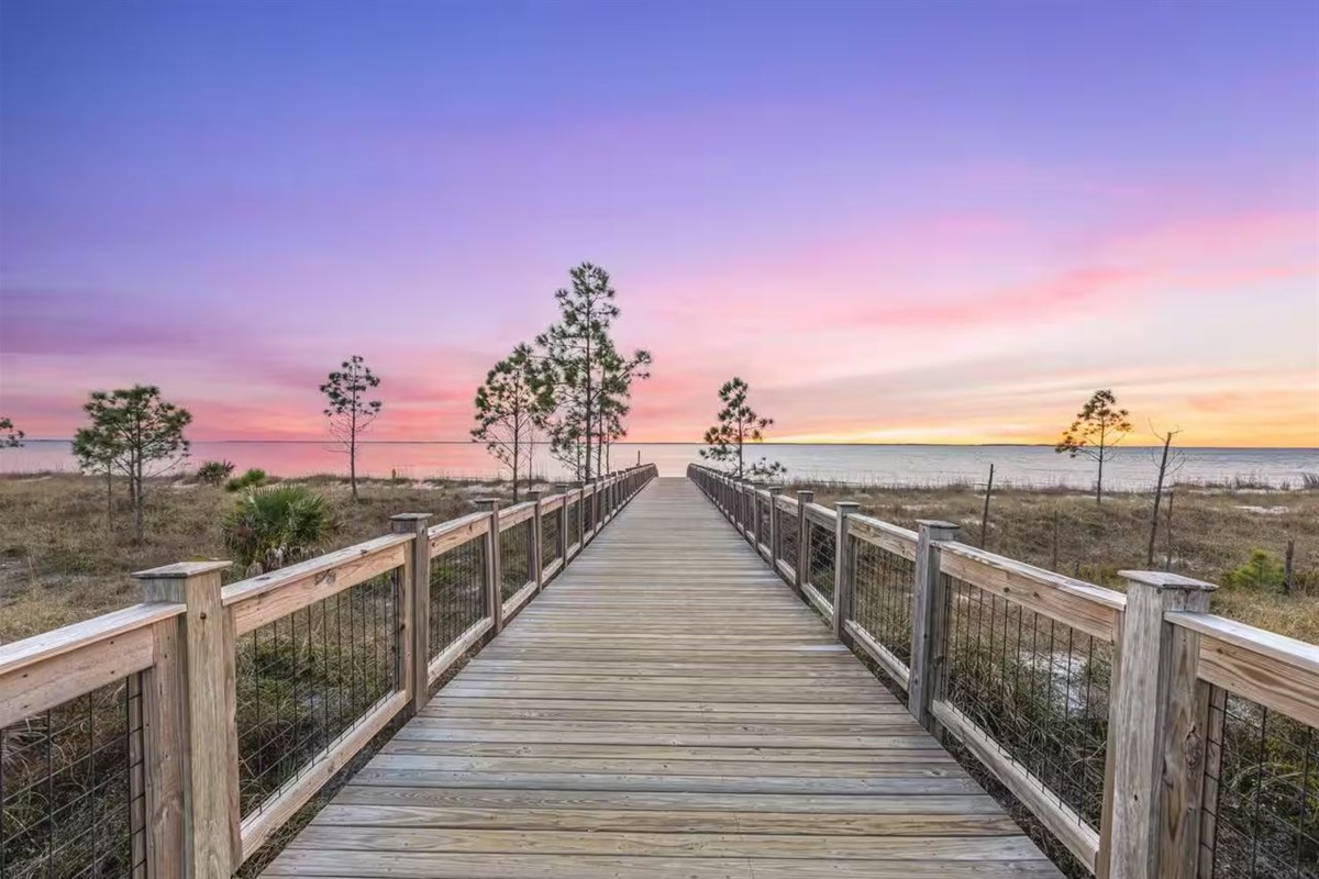 Beach! The four mile boardwalk spans the Bay. Beach access is just a short 5 min. walk or 1 min. golf cart ride from the house.