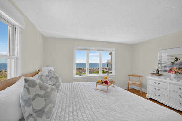 Wake up to beautiful coastal views from this bright and peaceful bedroom.