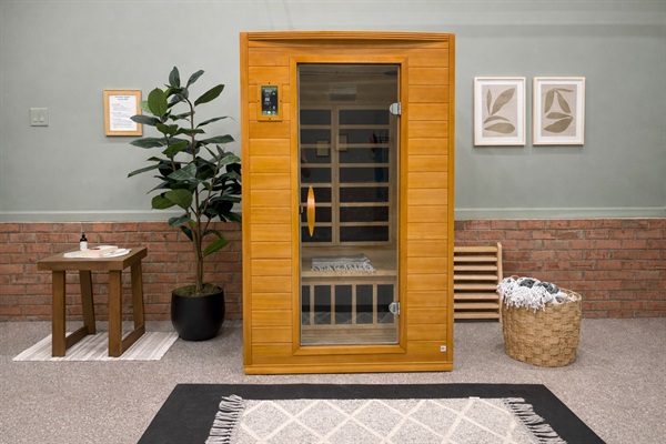 Private two-person infrared sauna for elevated post-round recovery and relaxation.