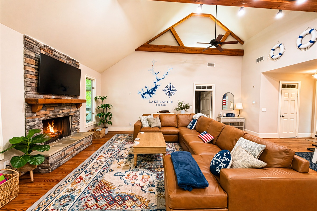 Movie night, game night, or fireside relaxing — this great room was made for lakehouse memories.