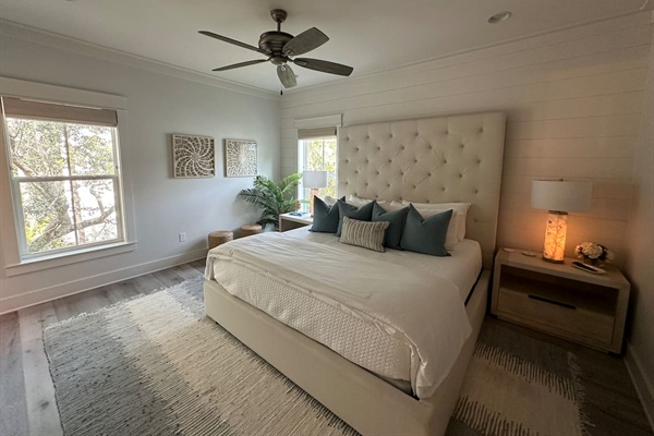 Spacious 2nd level king bedroom suite with full ensuite bathroom, tiled shower, dual vanity sinks, and newly remodeled outdoor shower.