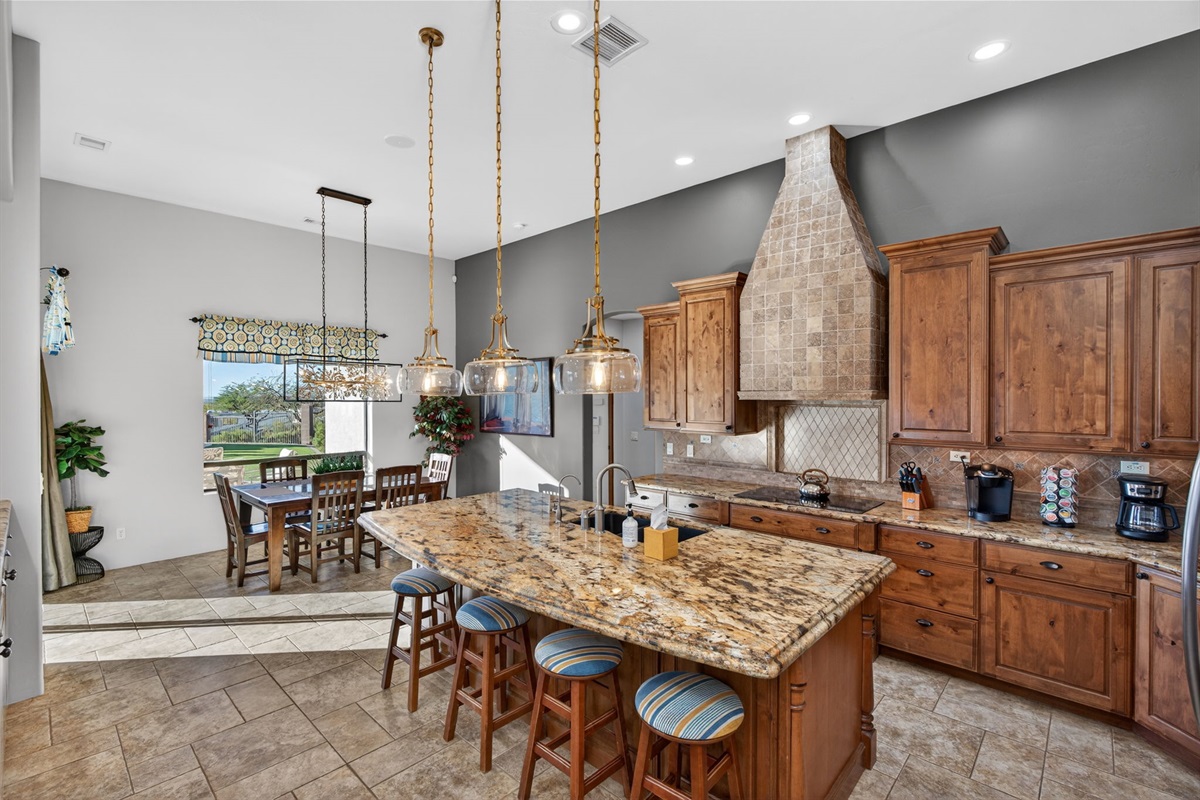 Chef-inspired kitchen with oversized island and premium finishes — perfect for cooking together and entertaining