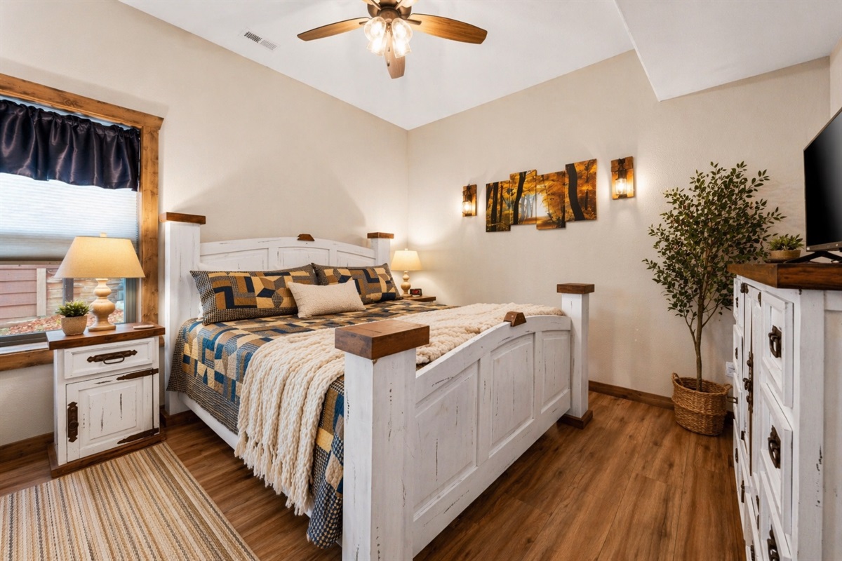  Relax in this cozy king bedroom after a day at the lake