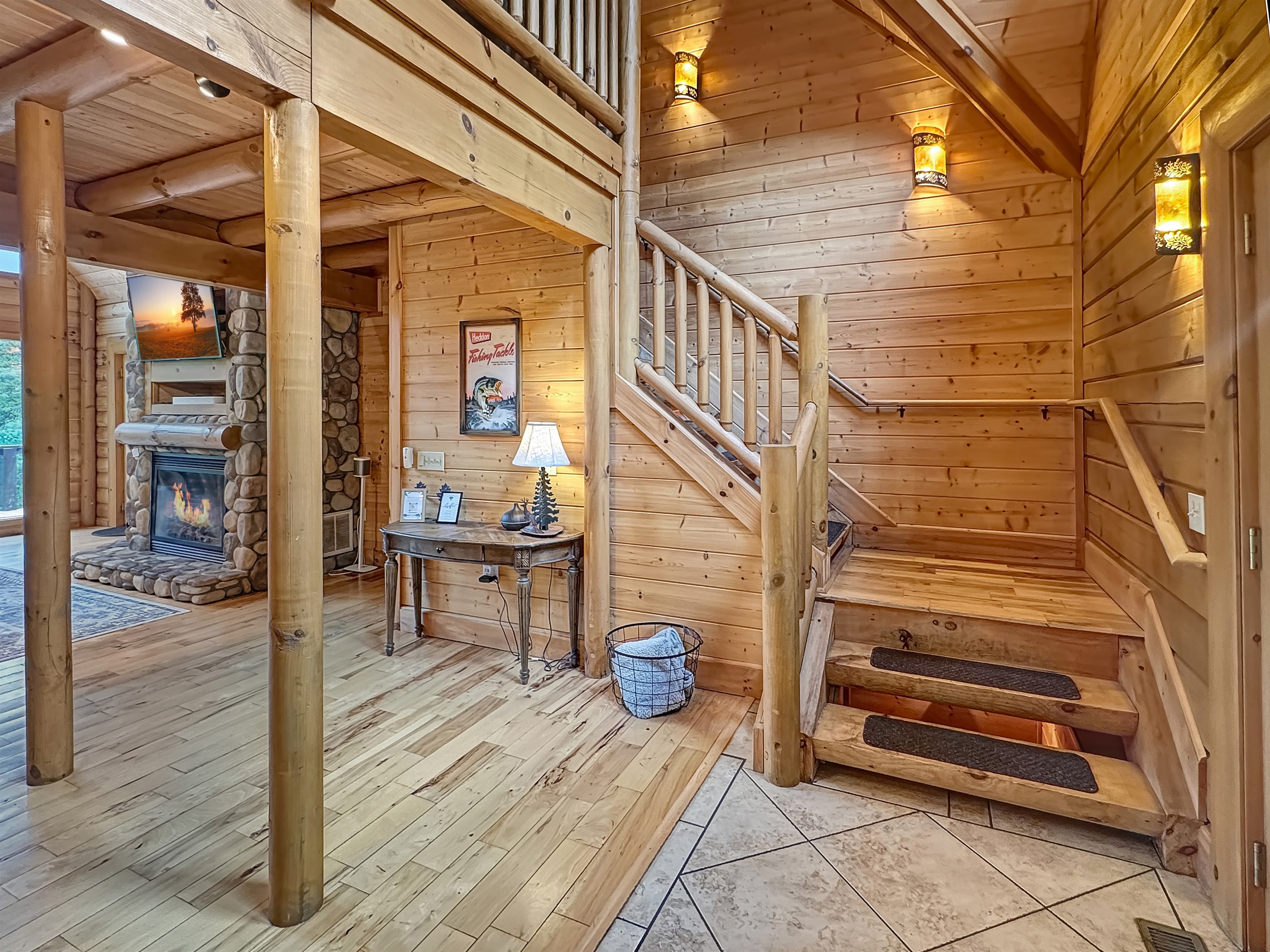 Entryway: Step into rustic charm with warm wood accents and a cozy fireplace ambiance!