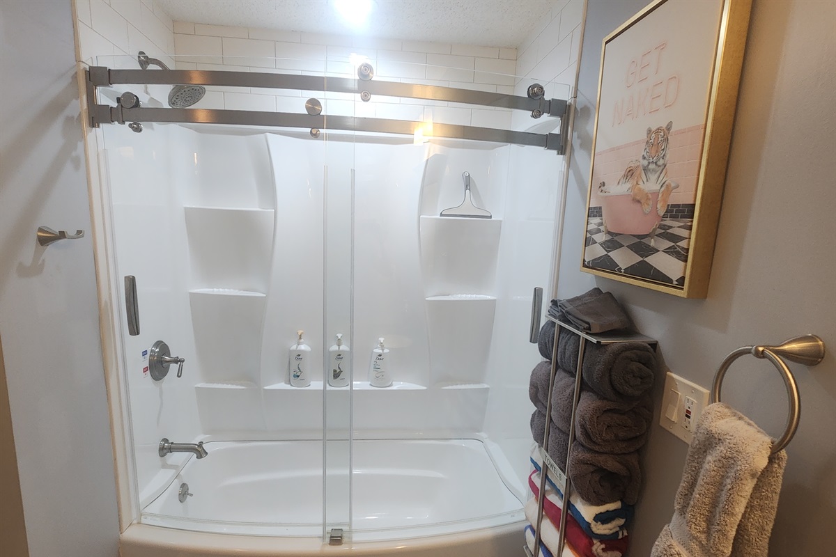 Bathroom with shampoo, conditioner, and body wash