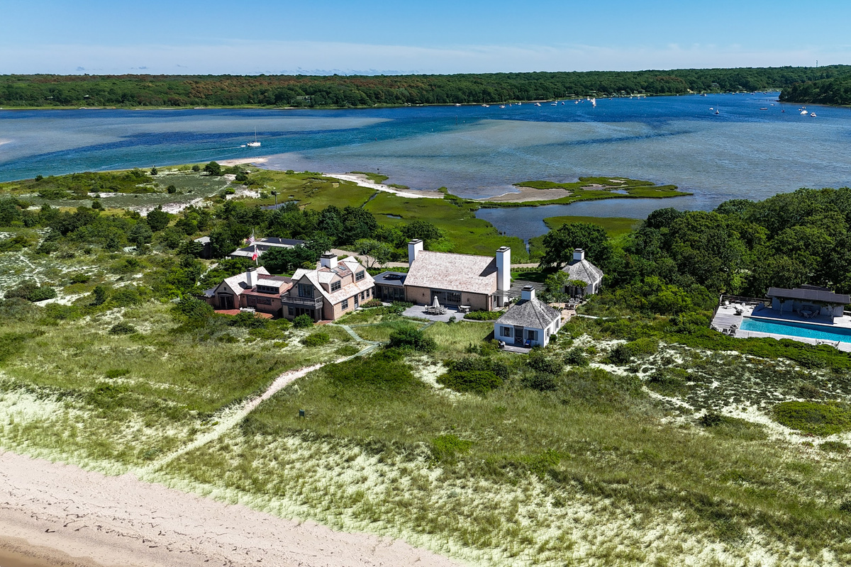 Aerial view over the dunes to the main house