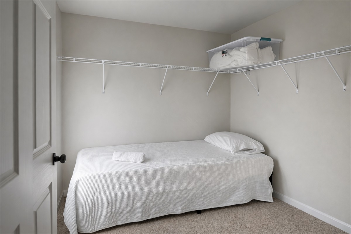 Walk in Closet with a twin bed