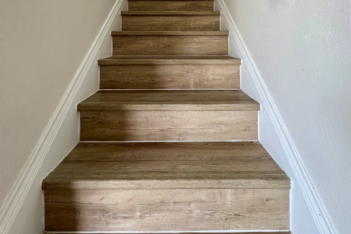 Stairs inside home leading to the bedrooms