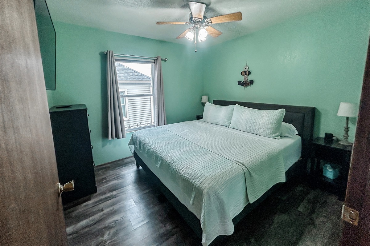 [Bedroom #3] King bed with TV.