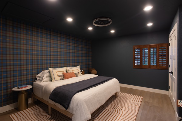 This soon-to-be-re-photographed custom bunked loft features two Twin beds with headboard separation over this plush King—perfect for kids, teens, or adults who don’t want to draw straws. Comfort-forward and group-friendly.